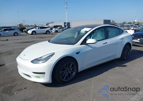 2022 Tesla Model 3 из США, поврежденный, VIN 5YJ3E1EB9NF337502